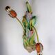 Paire de appliques italiennes en forme de tulipe et de feuille, bras en bois polychrome et métal, années 1960.