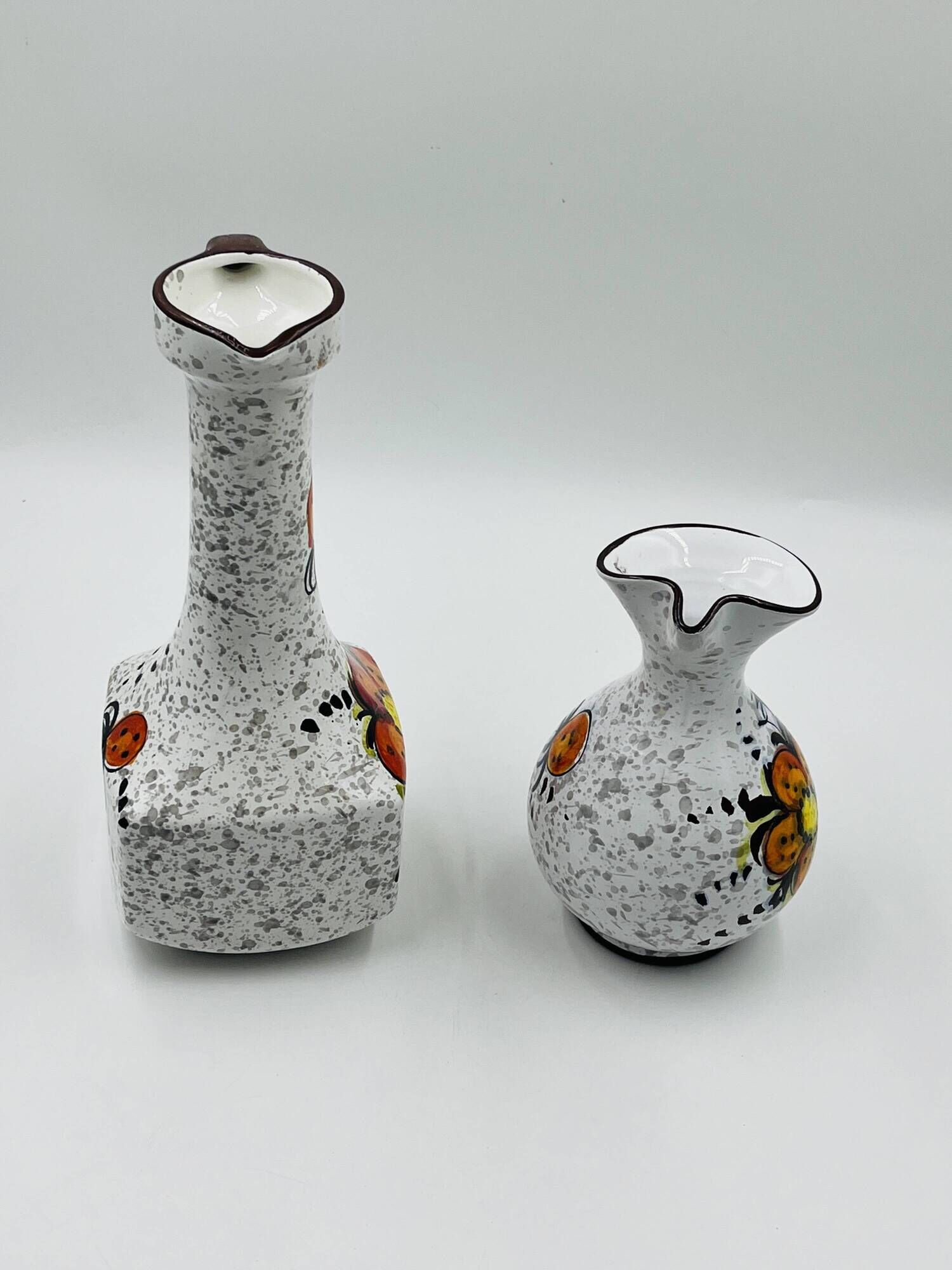 Pair of vintage hand-painted Italian floral vases