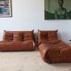 Ensemble Togo de canapé 2 places, fauteuil et pouf en cuir marron whiskey.
