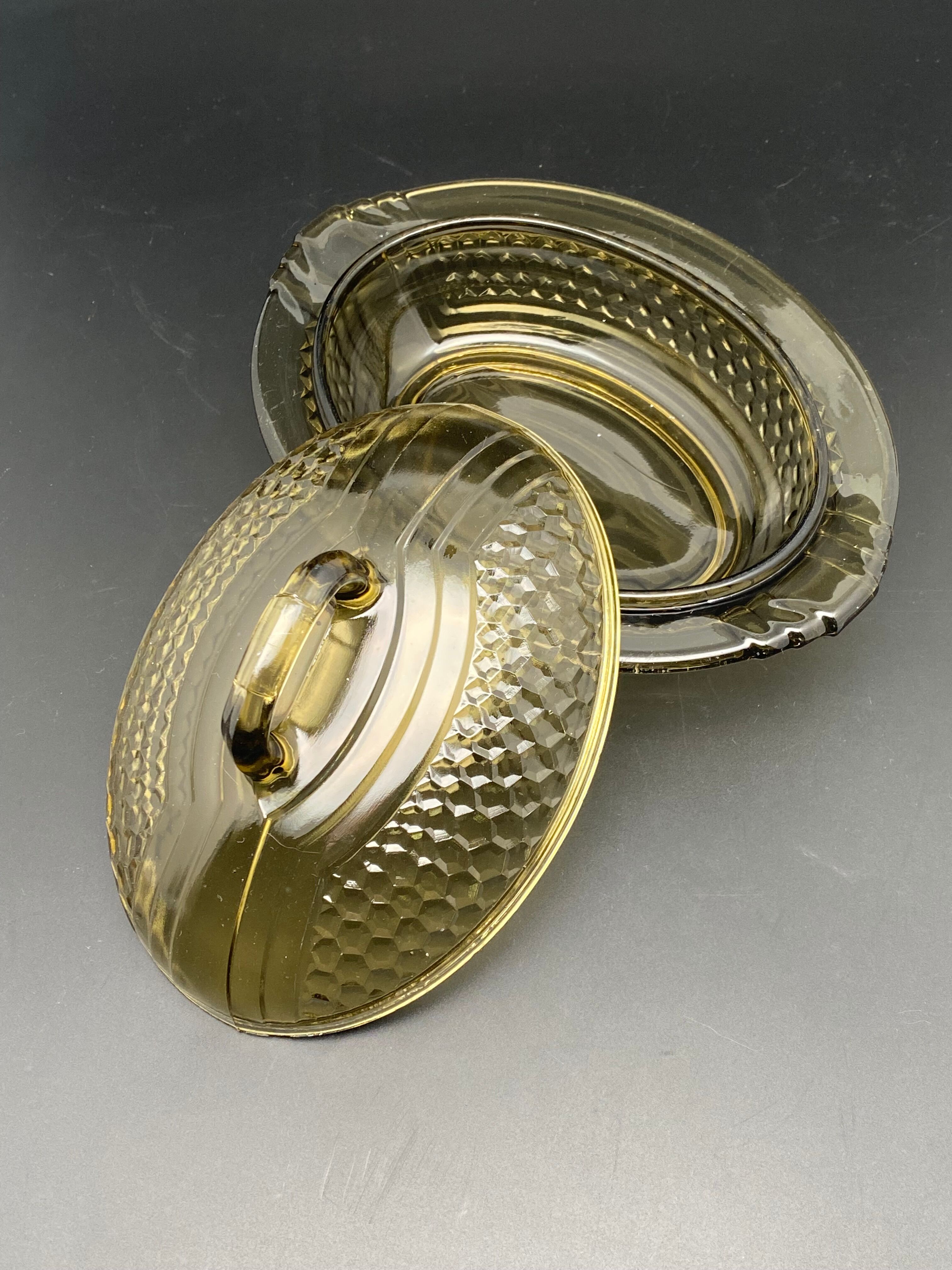 Butter dish or "little casserole" in black colored glass honeycomb pattern