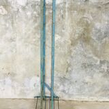 Rigid metal shoe shelf on legs - 1950