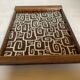 Vintage wooden tray with psychedelic Art Deco patterns.