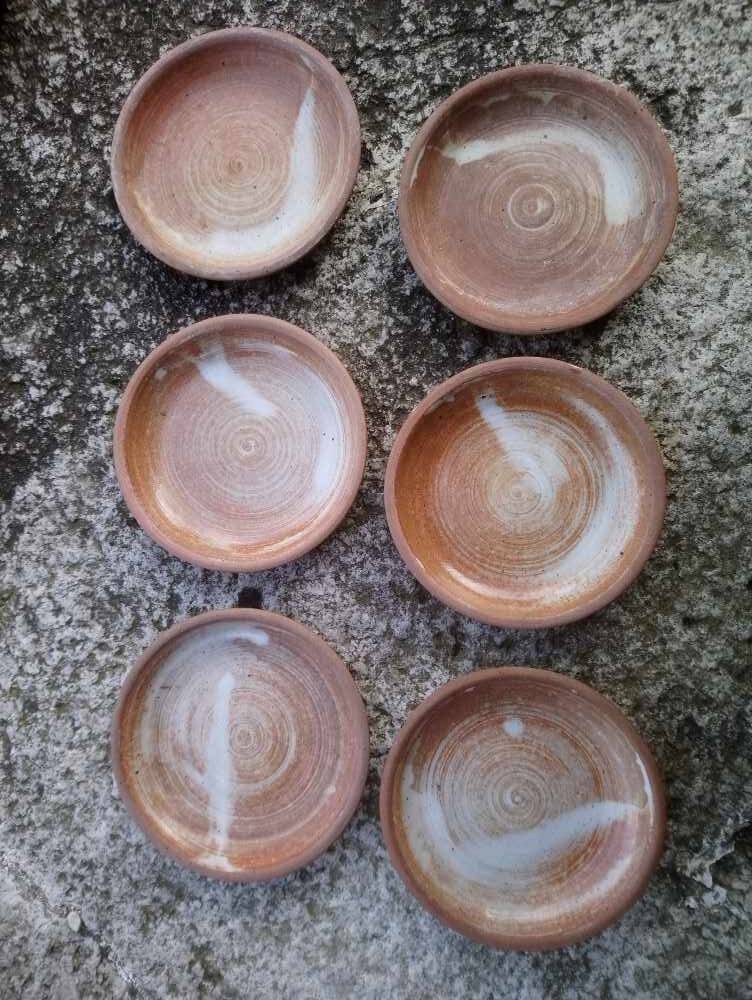 6 stoneware coffee cups and saucers