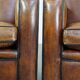 Set of 2 characterful, comfortable armchairs made of sheepskin leather with a sleek Art Deco design