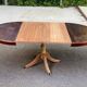 Extendable round dining table with central leg, renovated in raw wood, 20th century