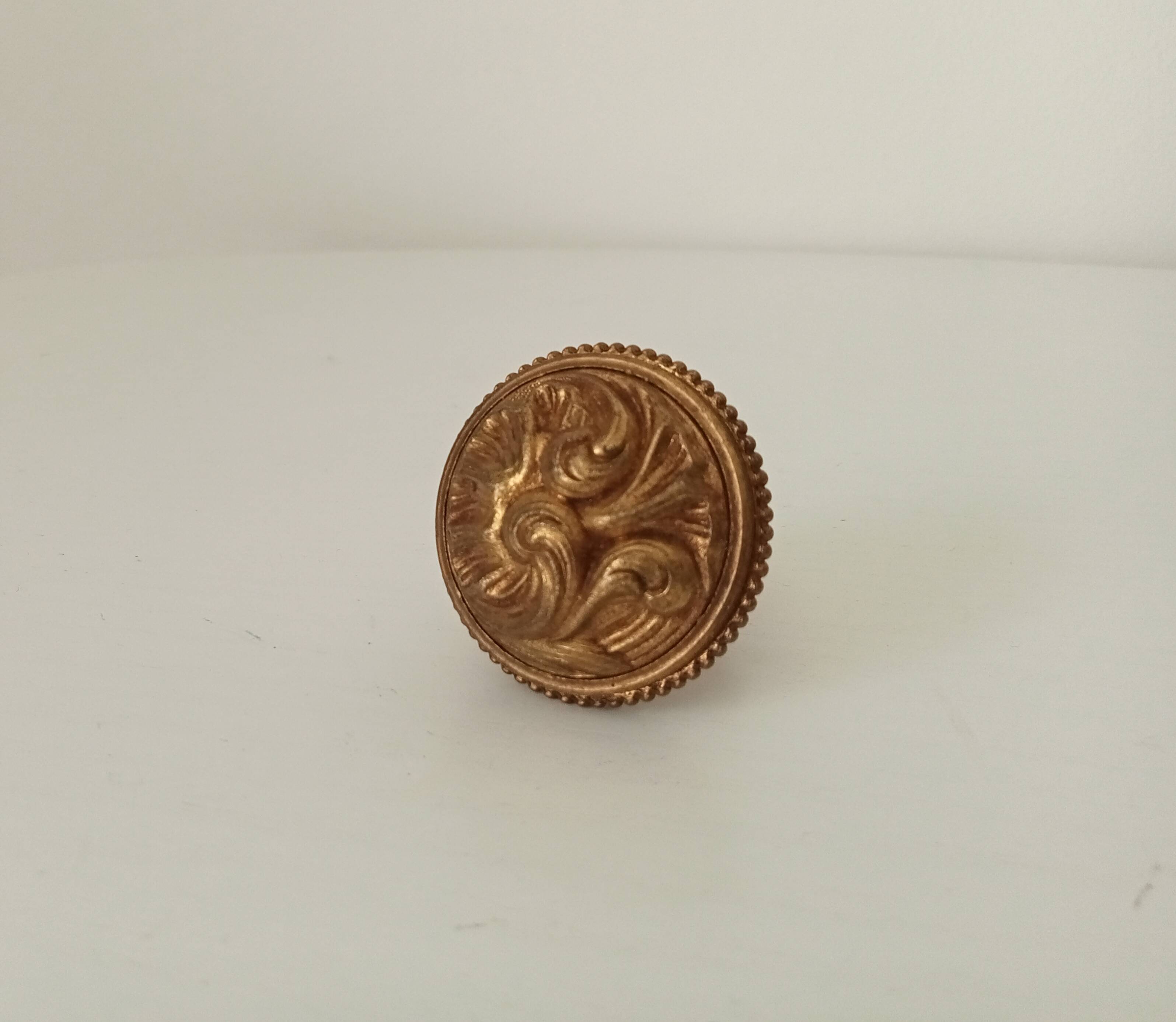 Antique furniture handle in chiseled solid bronze