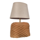 Oval table lamp in handcrafted ceramic with draped effect.