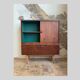 Vintage rosewood veneer top sideboard and dark green interior