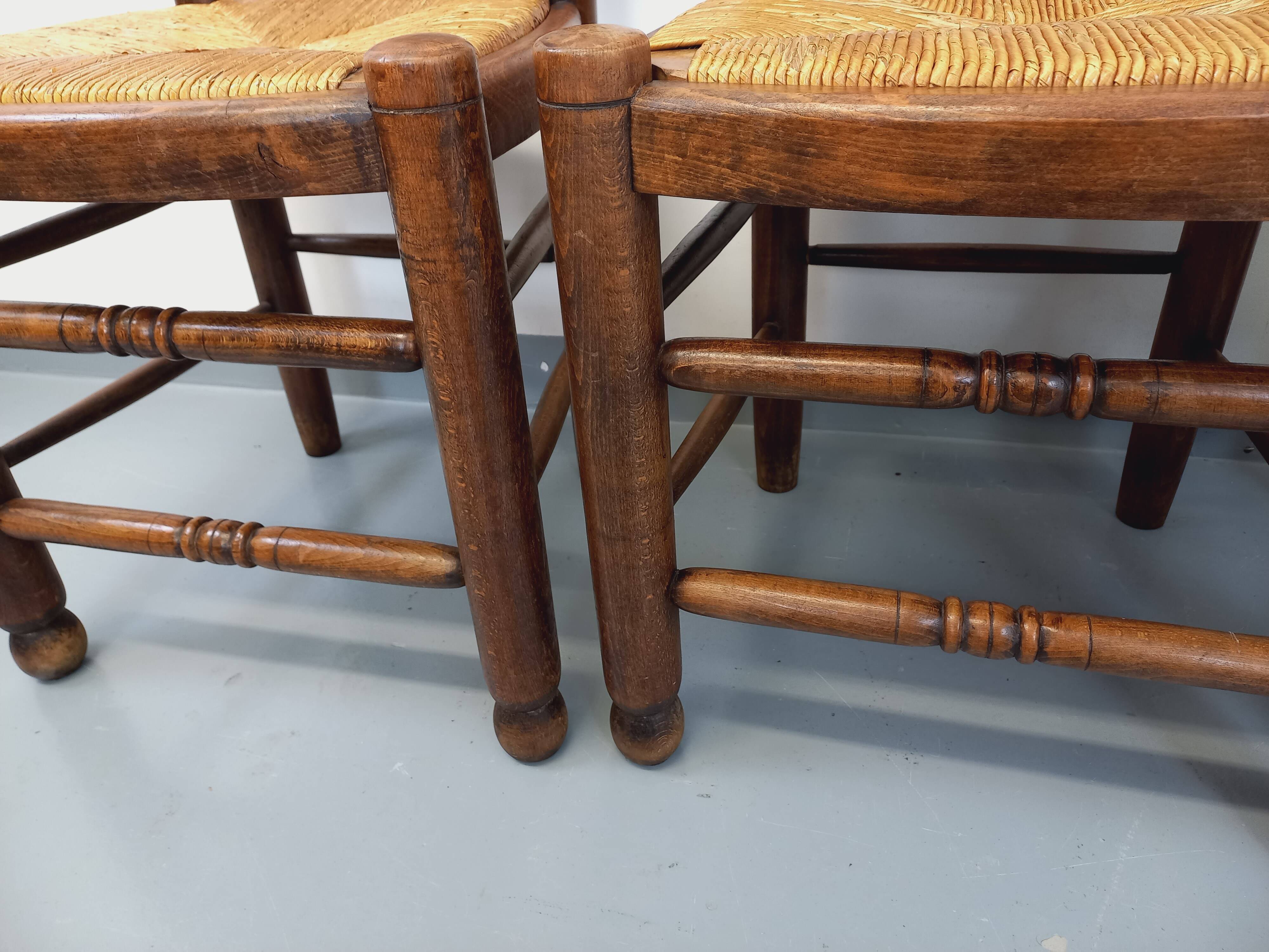 Set of 4 vintage brutalist Charles Dudouyt chairs in wood and straw from the 60s