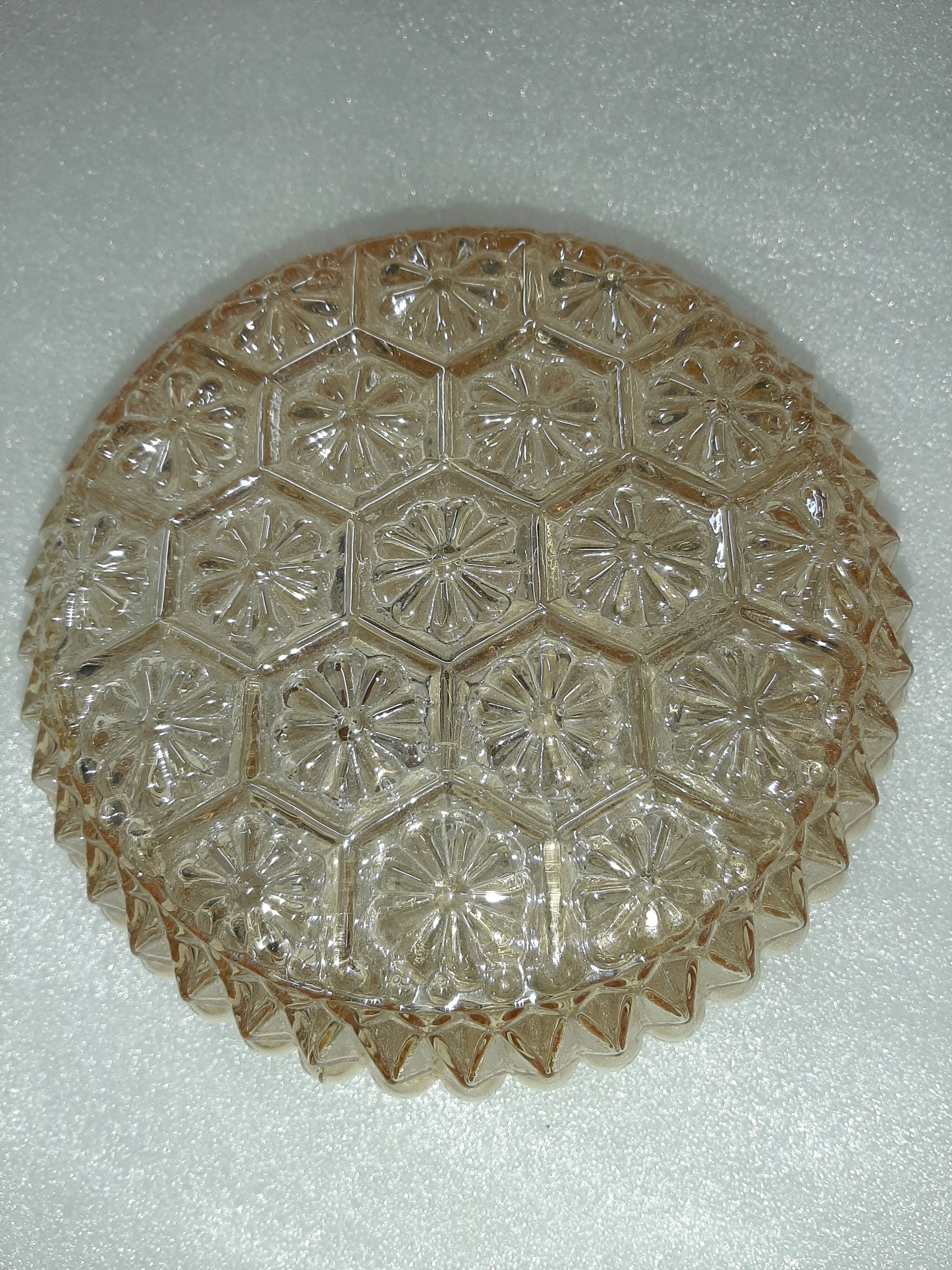 Moulded glass wall sconce