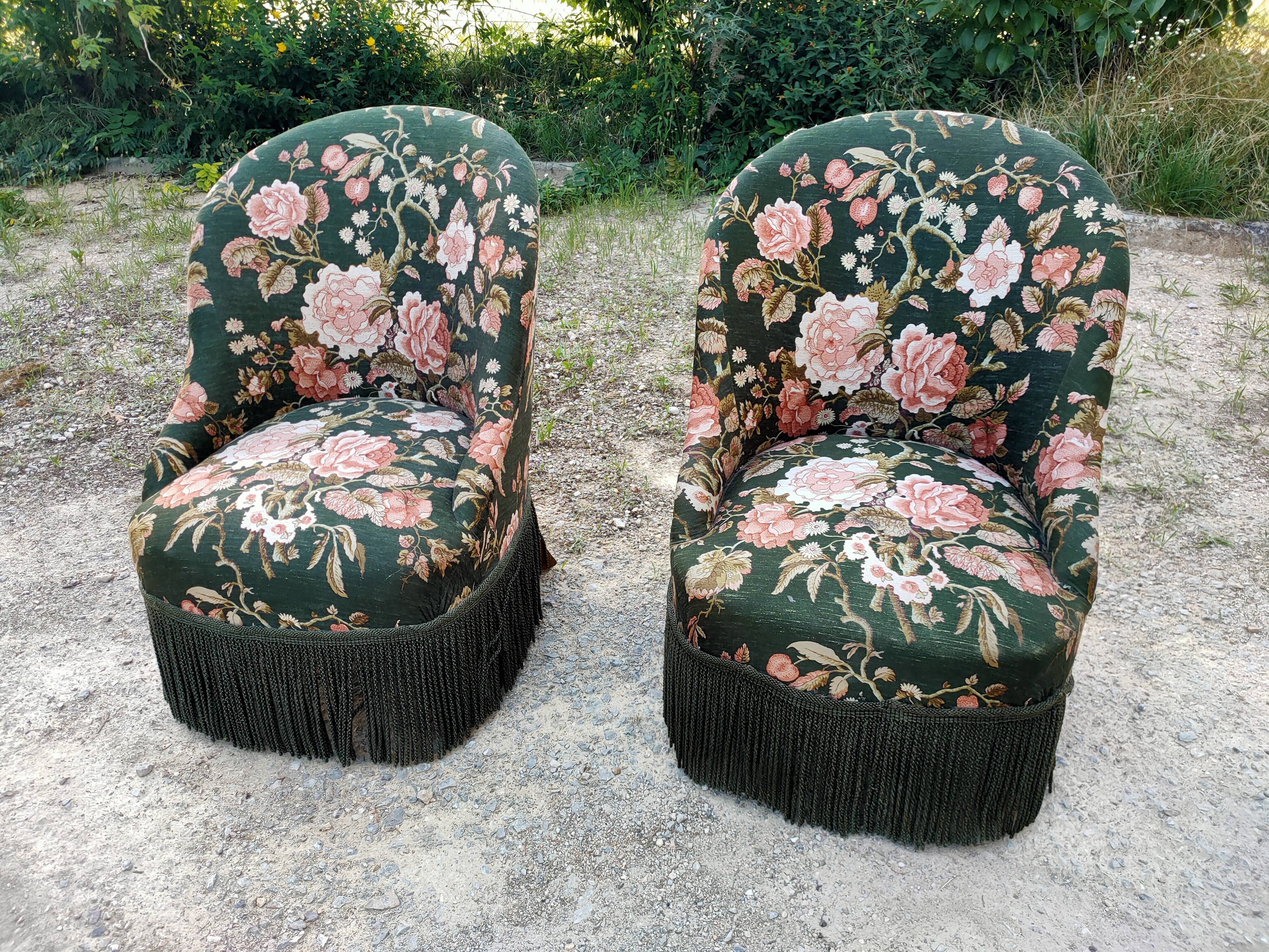 Two toad armchairs, floral motifs