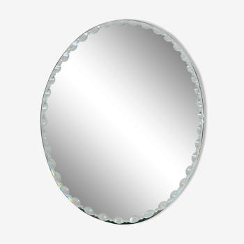 Old beveled oval mirror