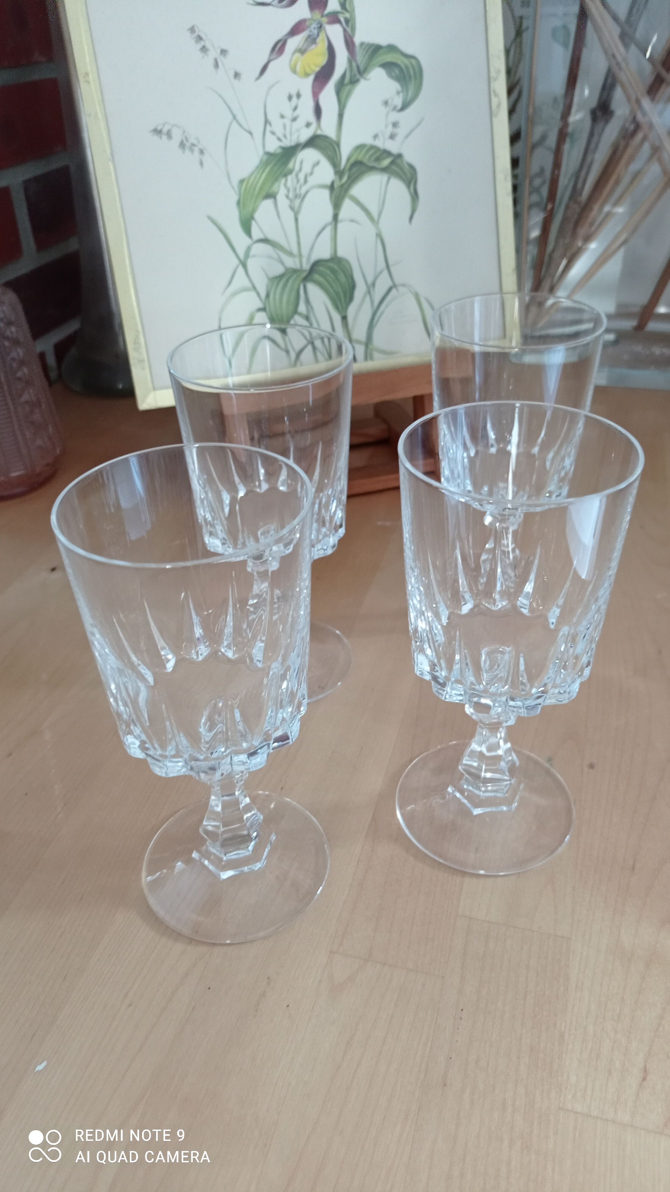 Set of four old foot glasses