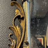 Miroir doré louis xv rocaille en bois sculpté et stuqué, xixe siècle