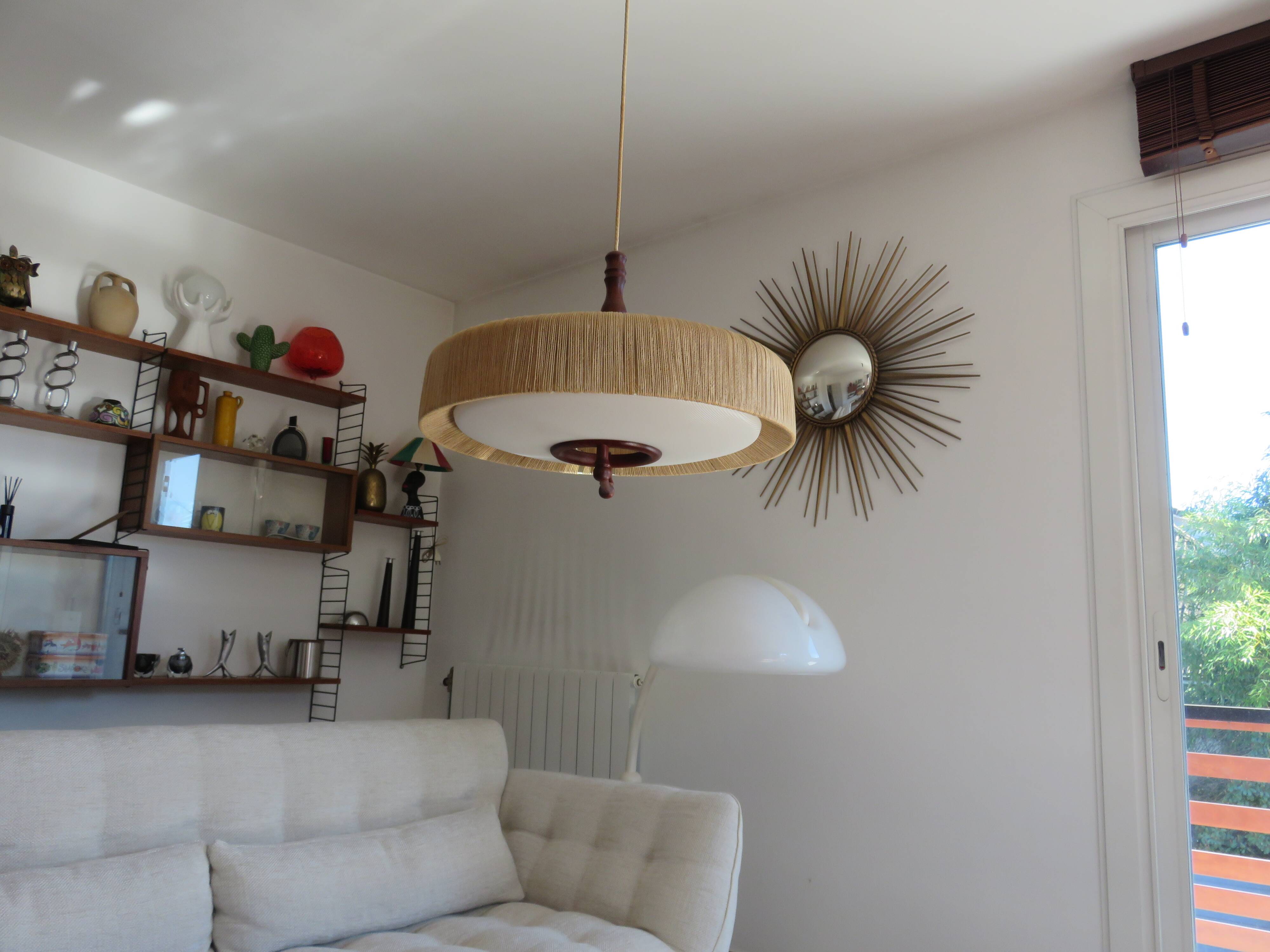 Suspension made of sisal and teak around 1960.