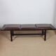Large black wood and leather bench, 20th century work