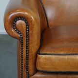 Fauteuil en cuir de mouton à l'aspect luxueux