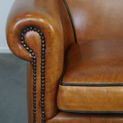 Fauteuil en cuir de mouton à l'aspect luxueux