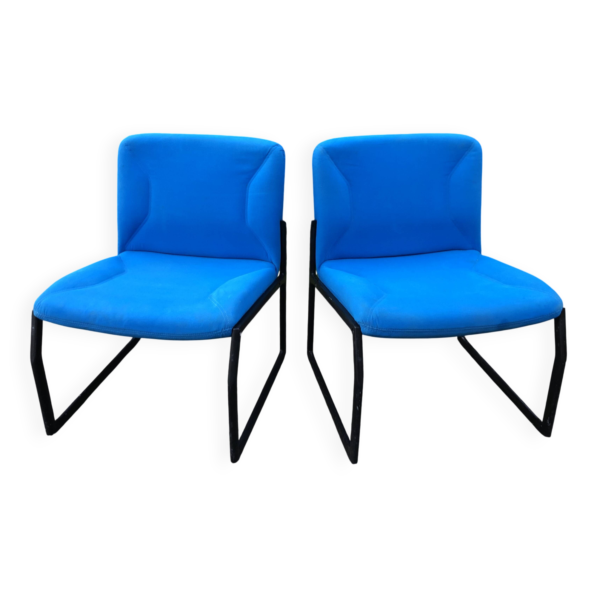 Electric blue fabric designer armchairs with black lacquered metal legs from the 80s.