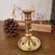Push candle holder with hollow dish