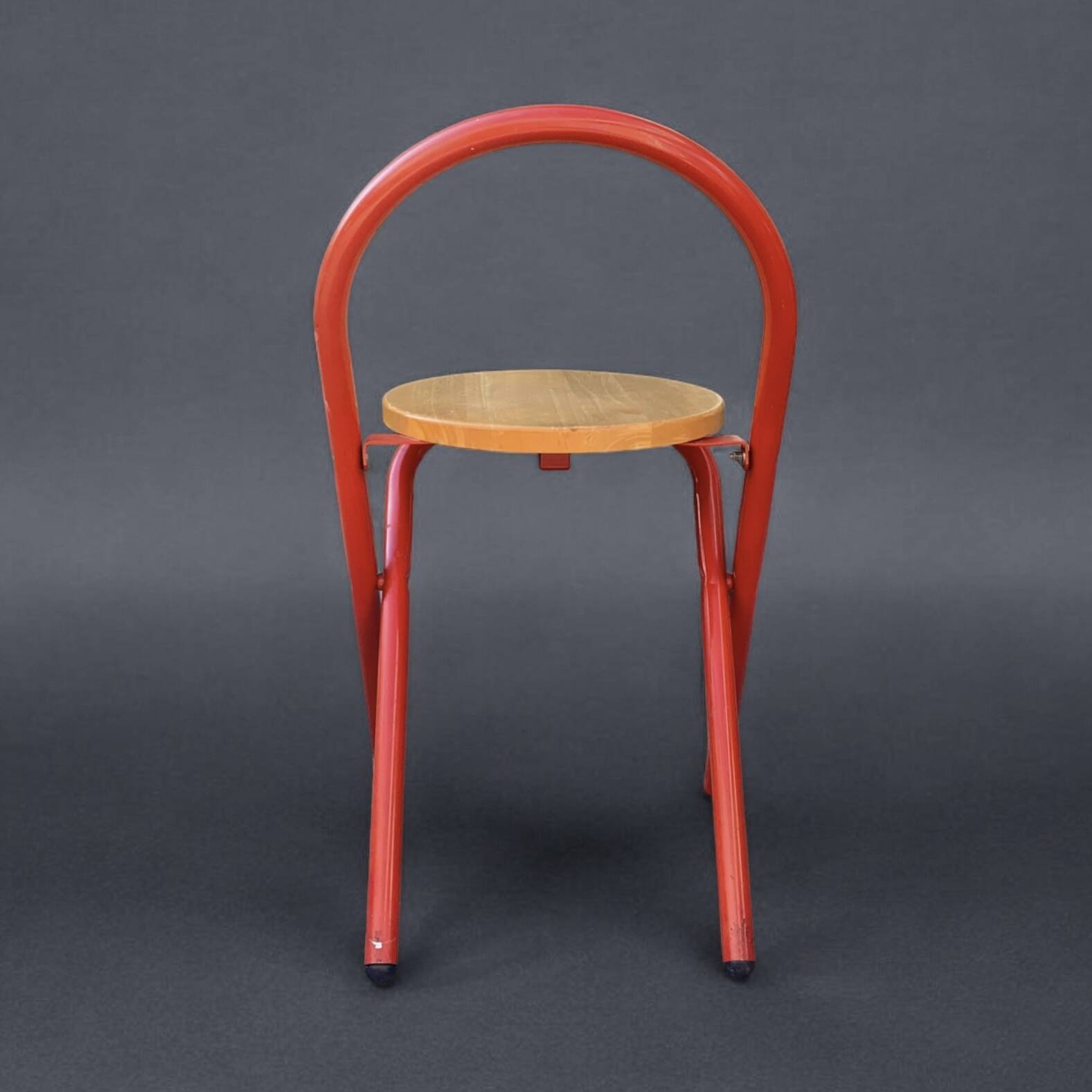 Vintage folding chair in red painted metal and wood