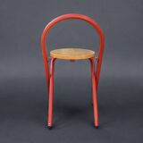 Vintage folding chair in red painted metal and wood