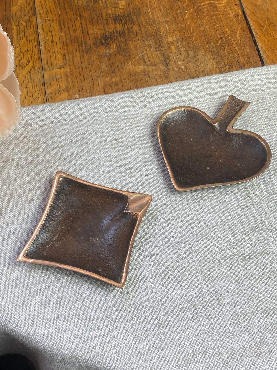 Bronze spade and diamond ashtrays
