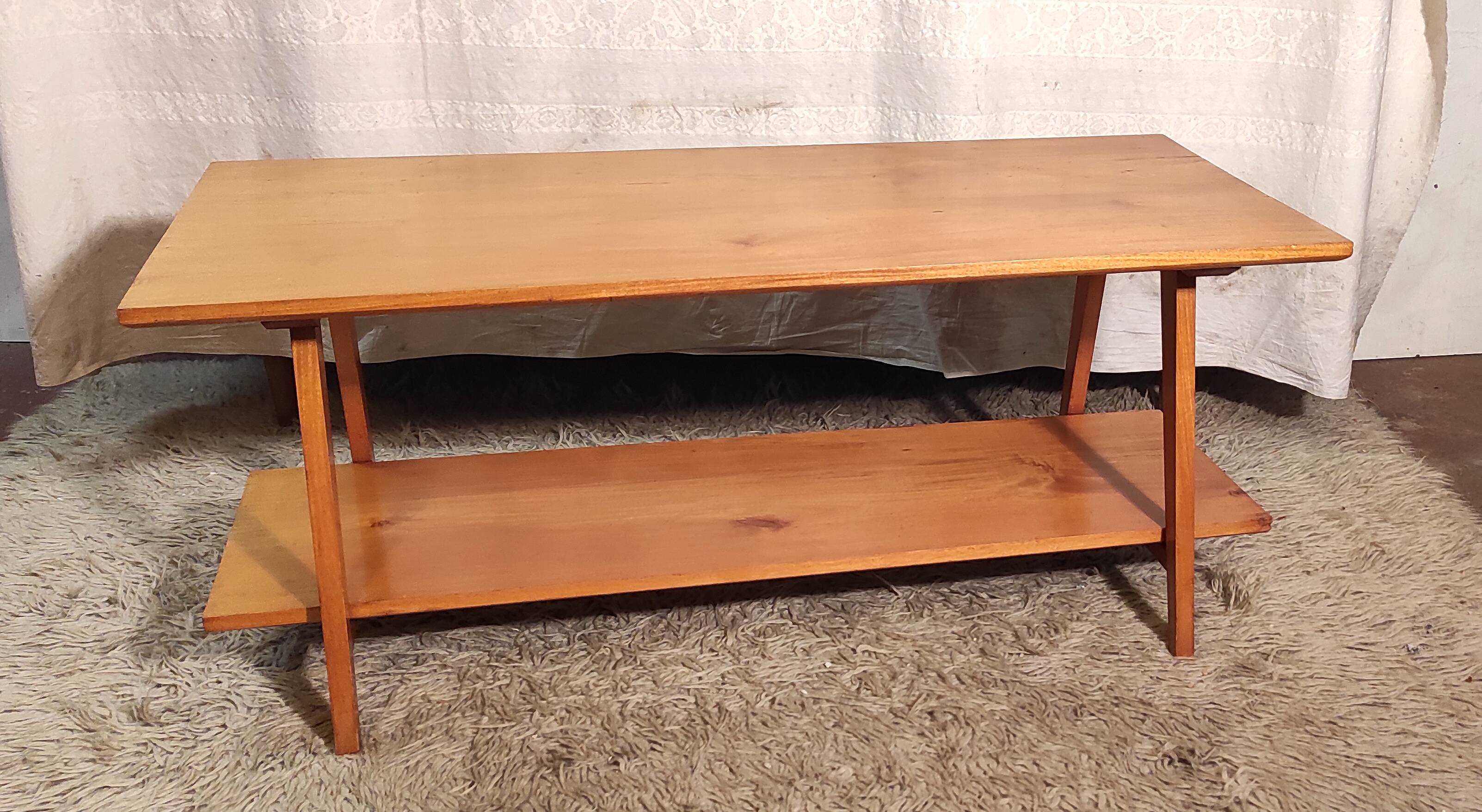 Solid wood coffee table with tapered legs - mid 20th century.