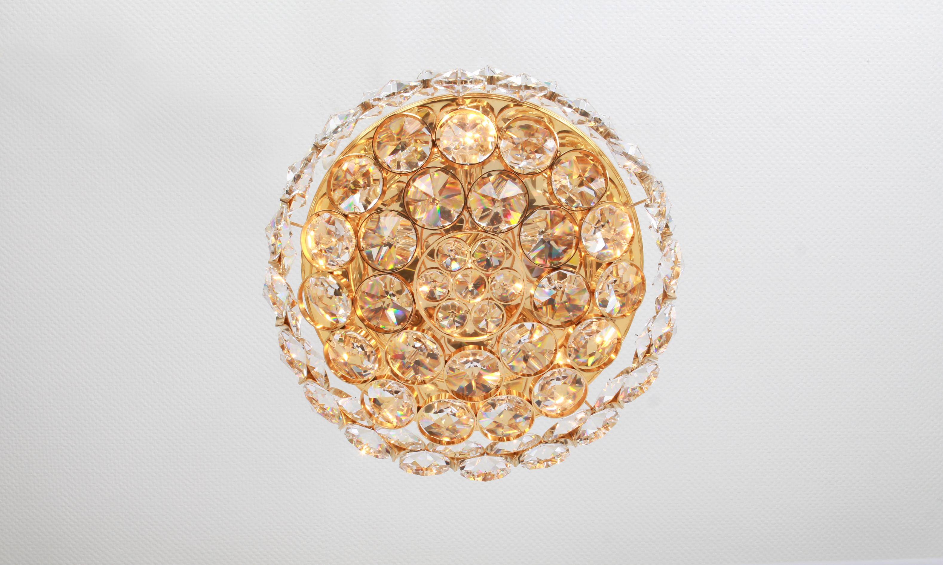 Chandelier in gilded brass and crystal glass inlaid by Palwa, Germany, 1970s.