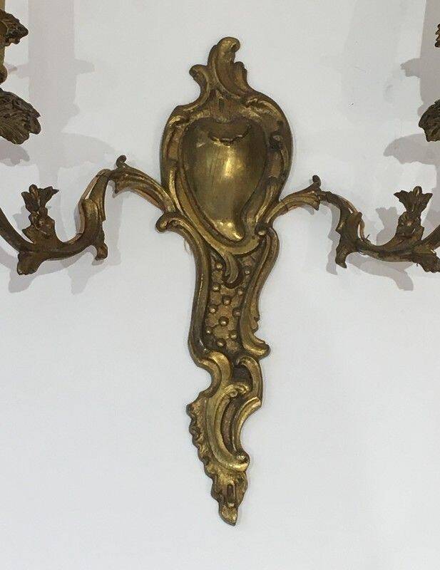 Pair of Louis XV style bronze wall sconces