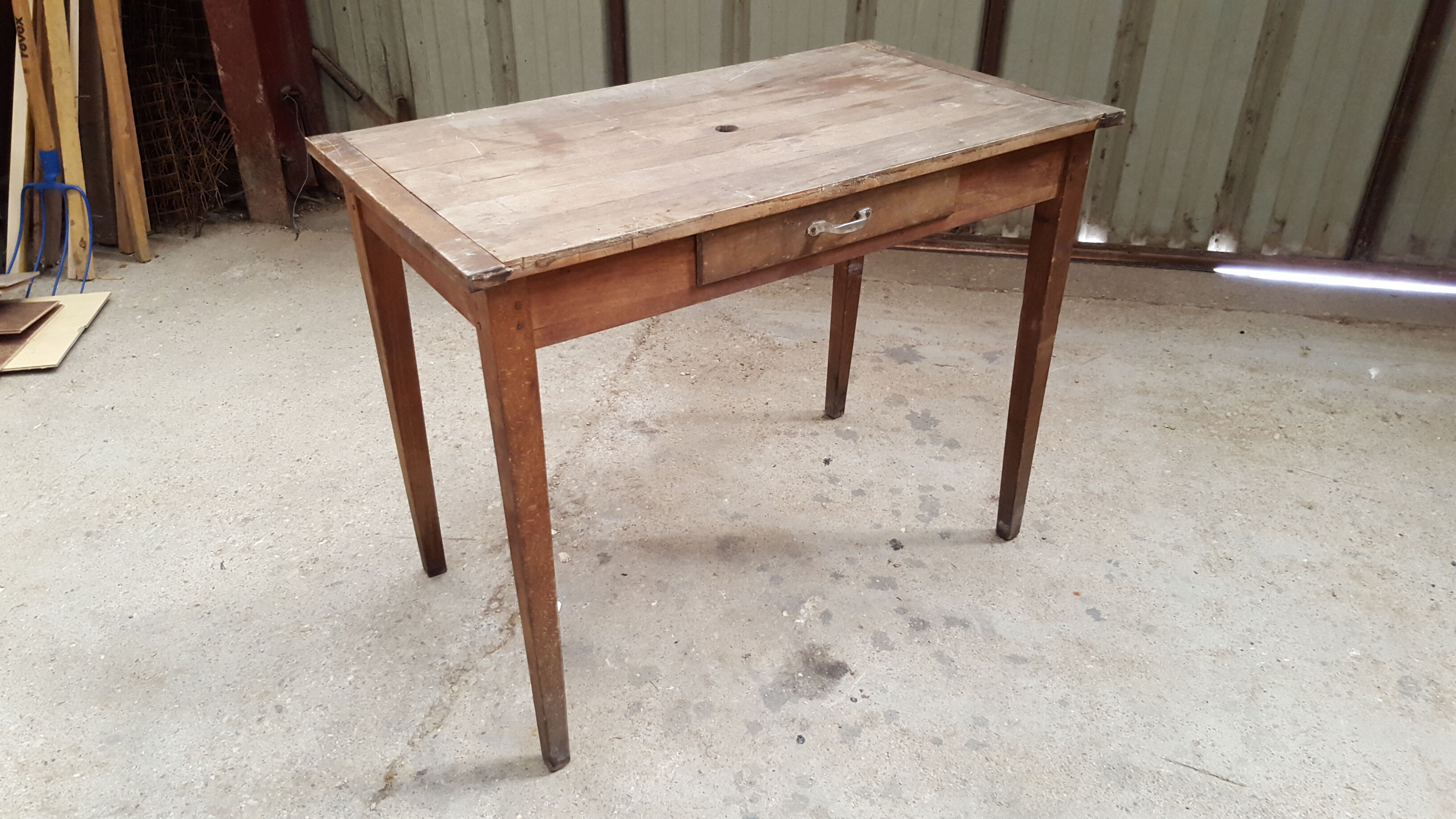 Old table feet spindles one drawer piling