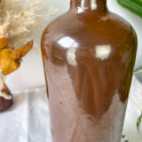 Vintage iridescent brown stoneware bottle