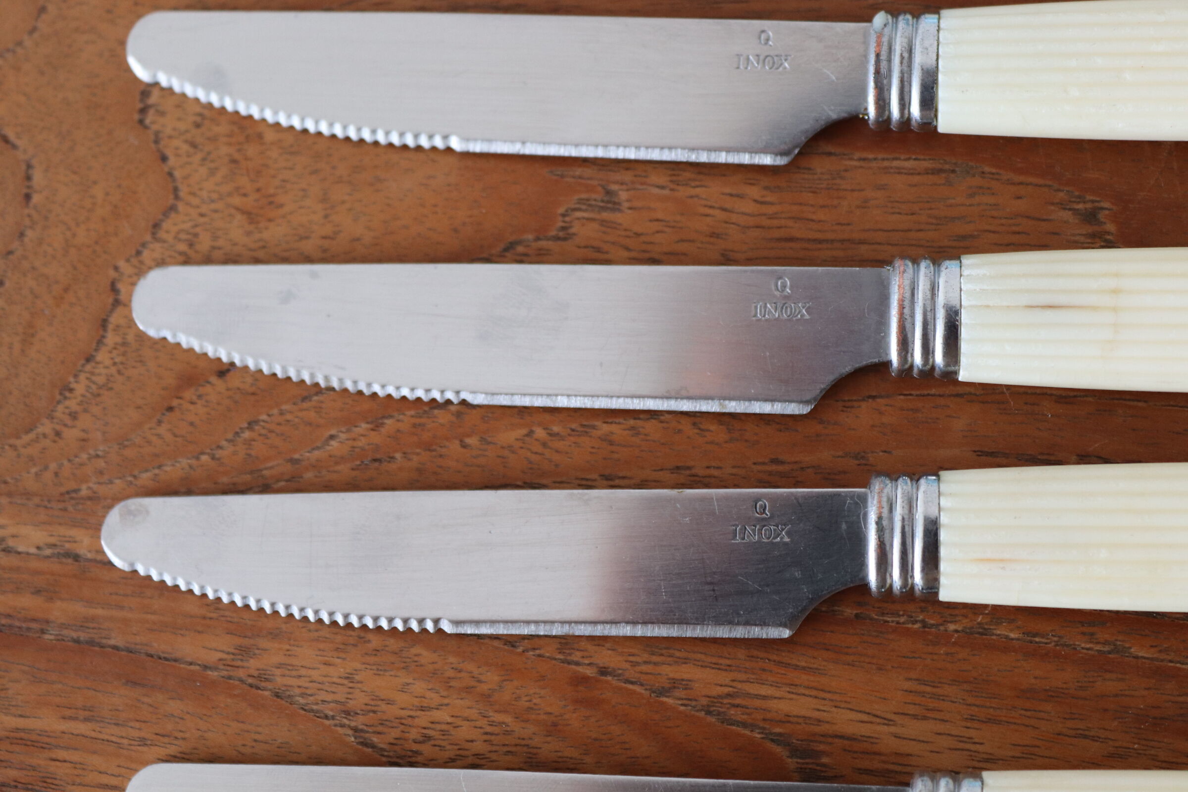 6 vintage cream white knives