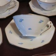 Suite de 10 tasses et sous-tasses art déco
