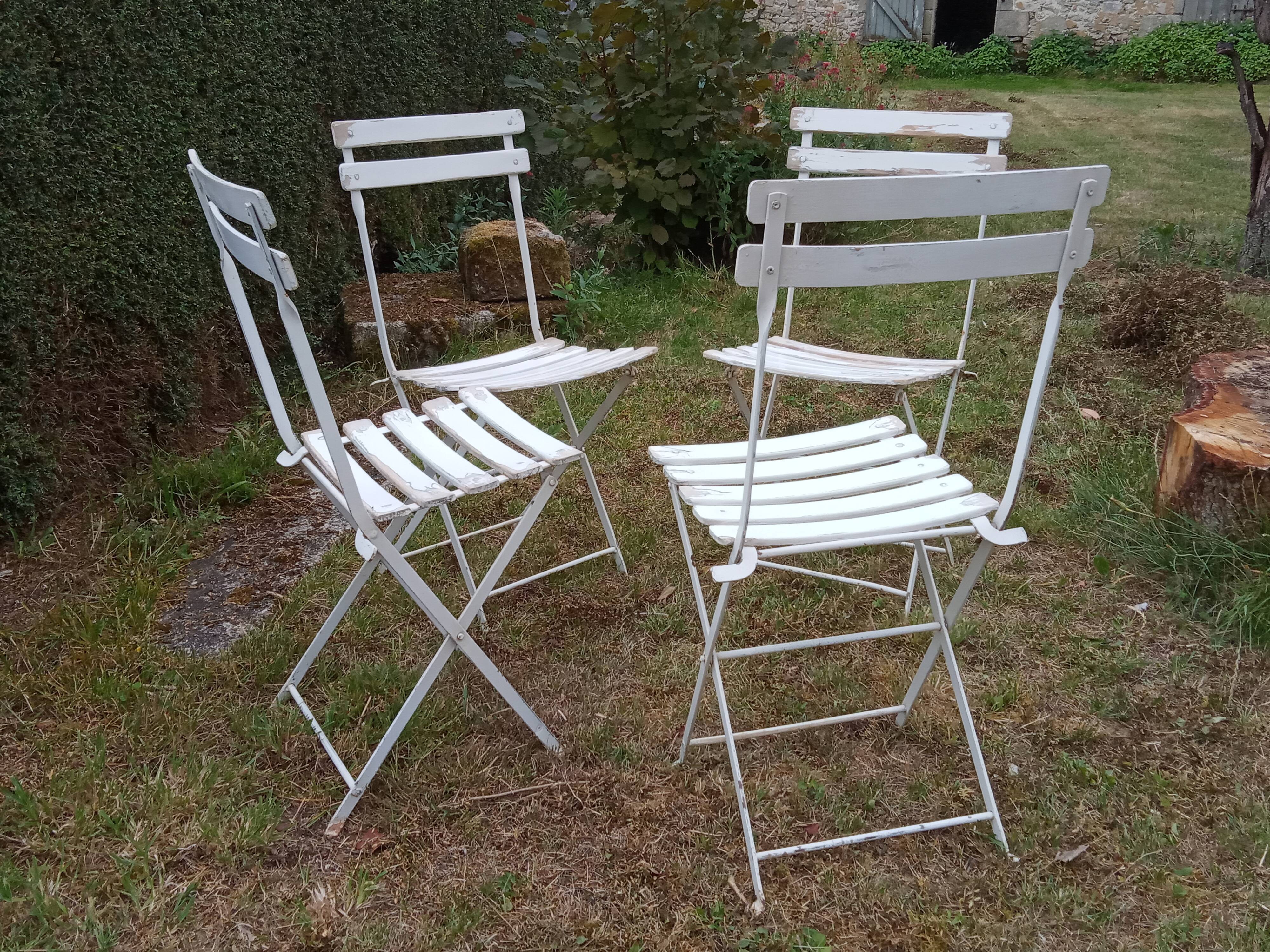 Four old garden chairs