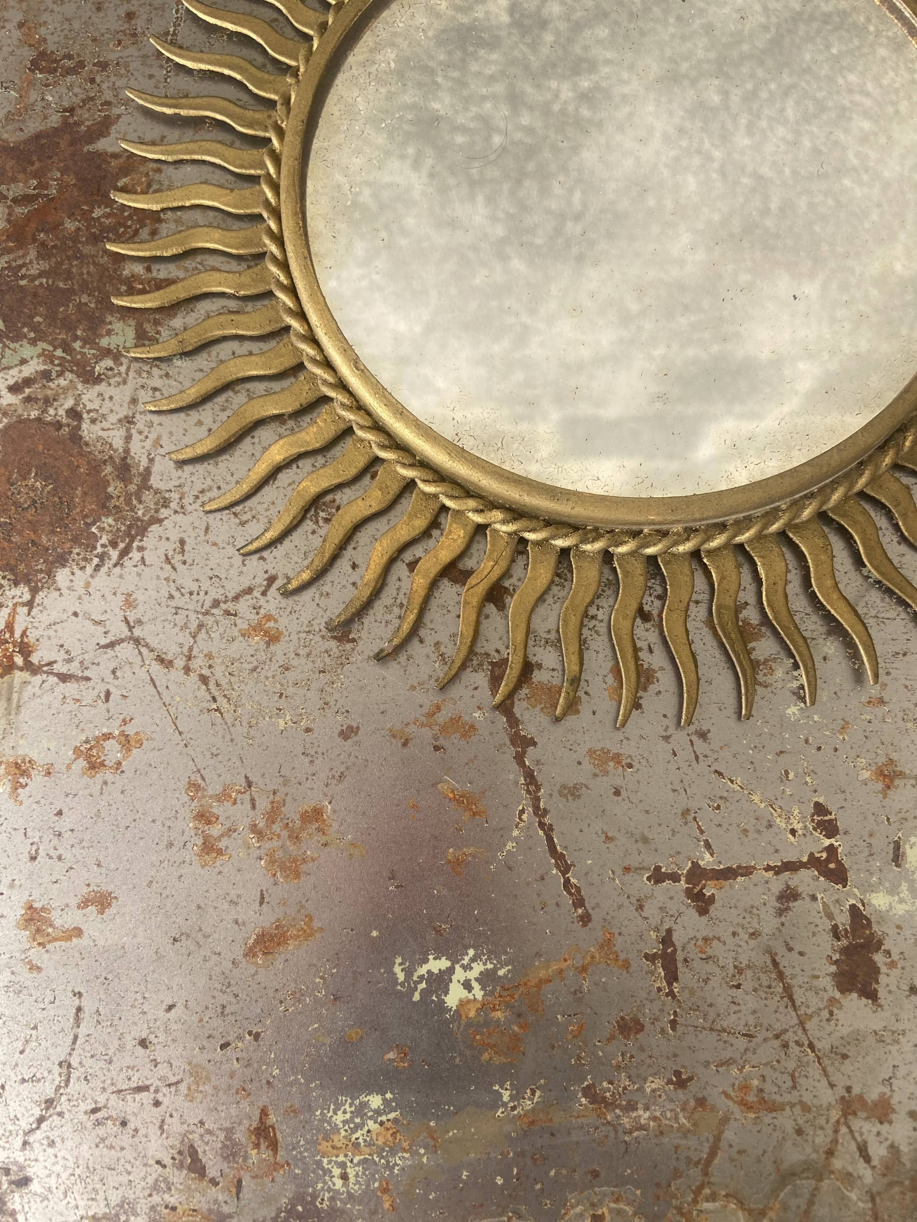 Vintage gold metal sun mirror