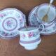 Duo of English porcelain tea cups from Queen's Richmond and spoons.
