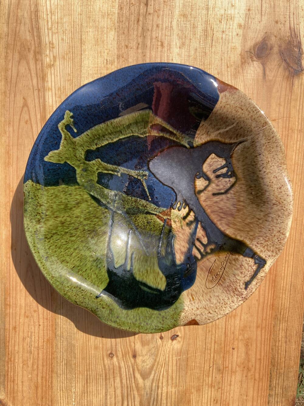 Ceramic dish signed Cerampuo