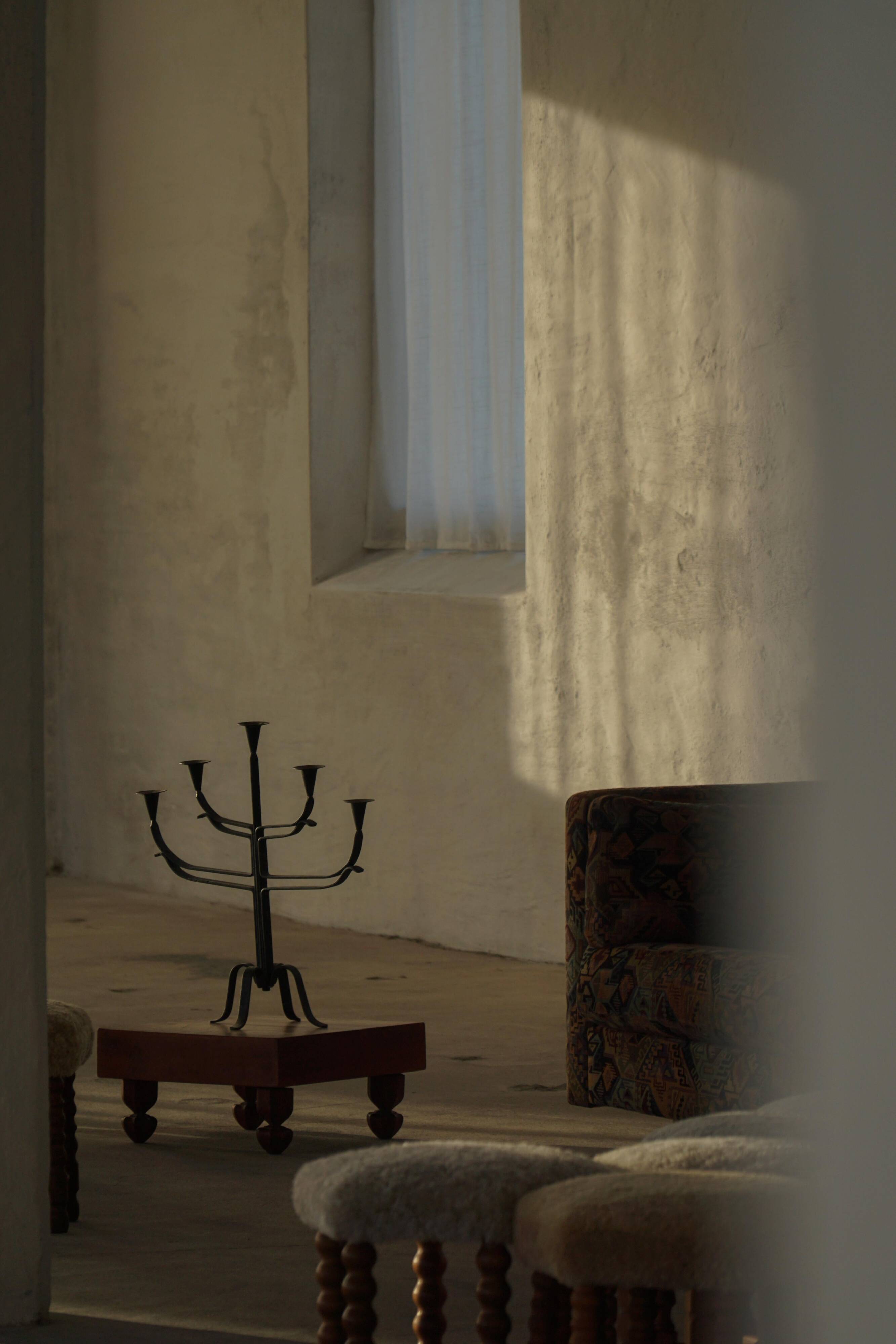 Brutalist Scandinavian candlestick in wrought iron and metal from the mid-20th century.