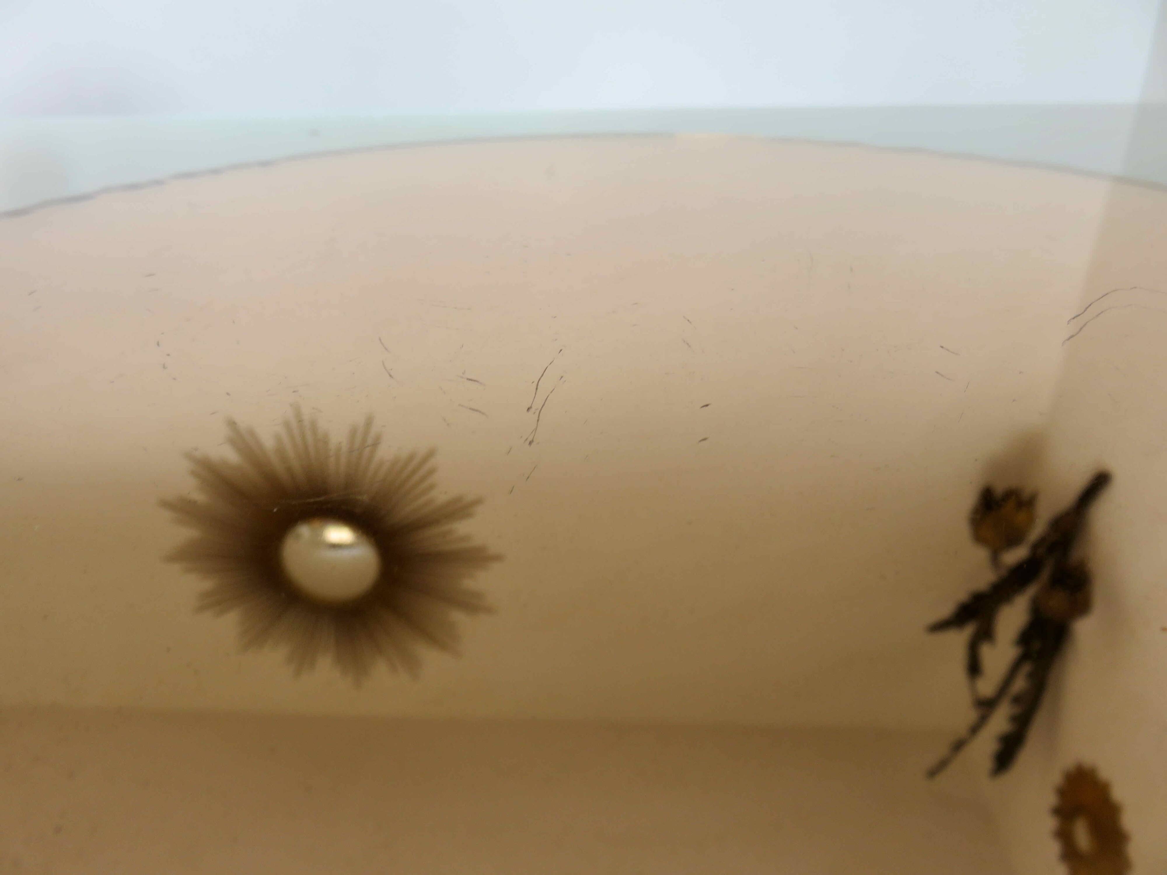 Round beveled amber pink mirror