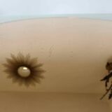 Round beveled amber pink mirror