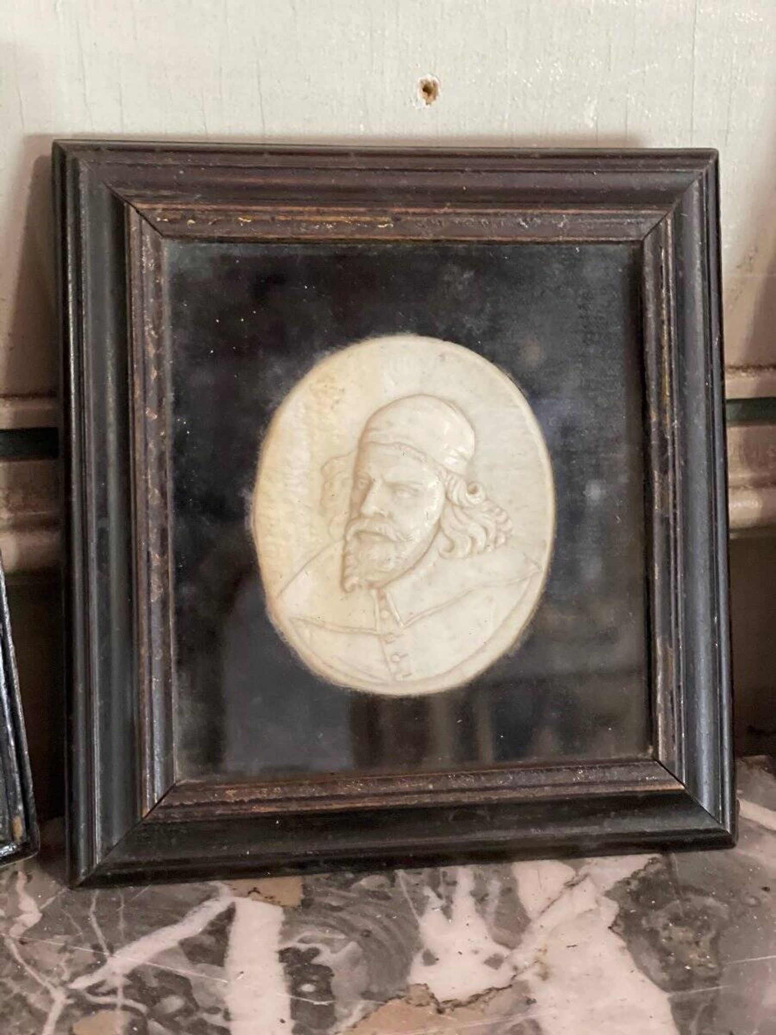 Sculpted ivory portrait suite, England circa 1880, sold in accordance with CITES regulations.