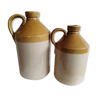 Duo of stoneware decanter bottles