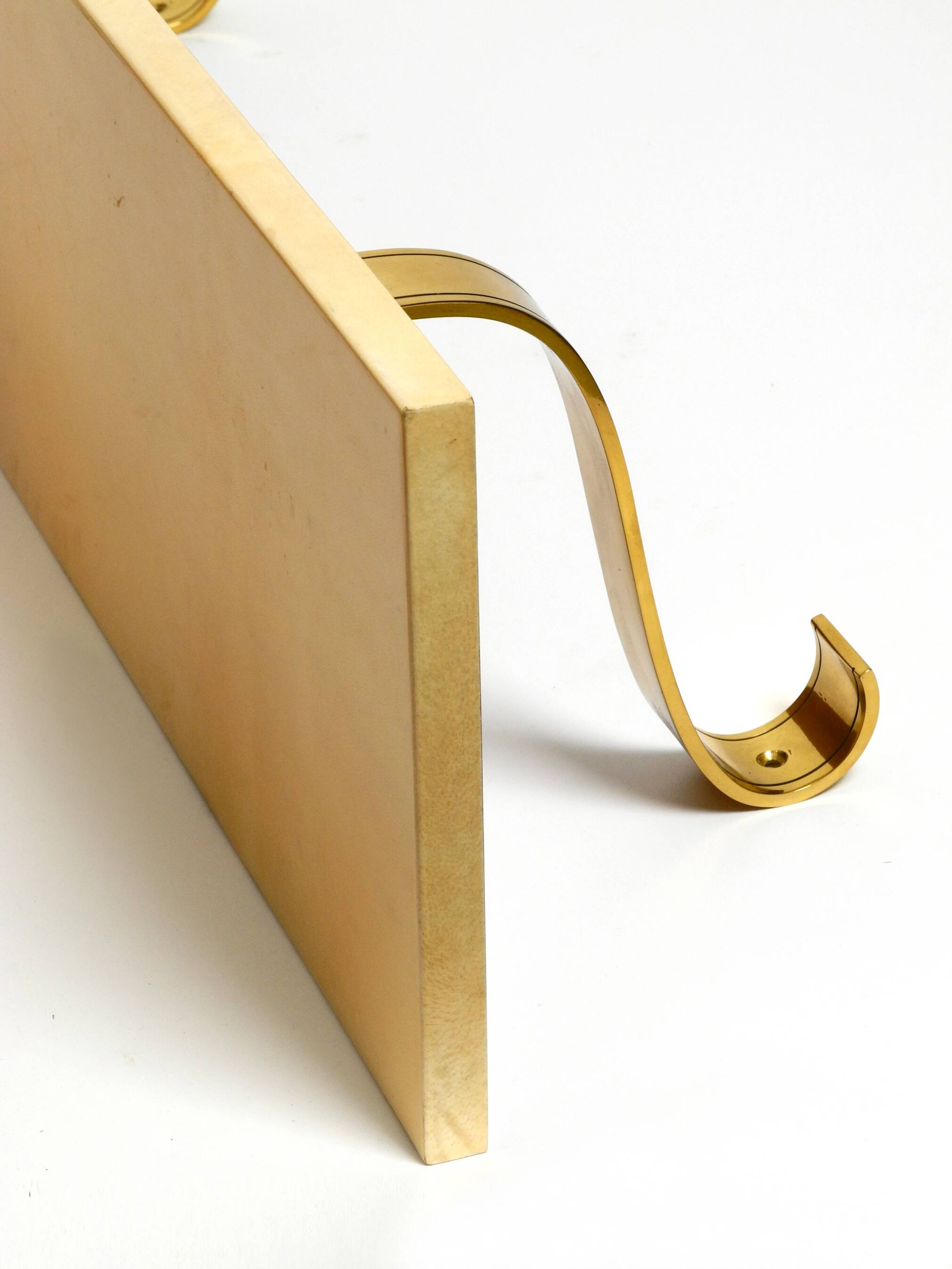 Two 1960s large Aldo Tura shelves made of wood and goatskin in beige