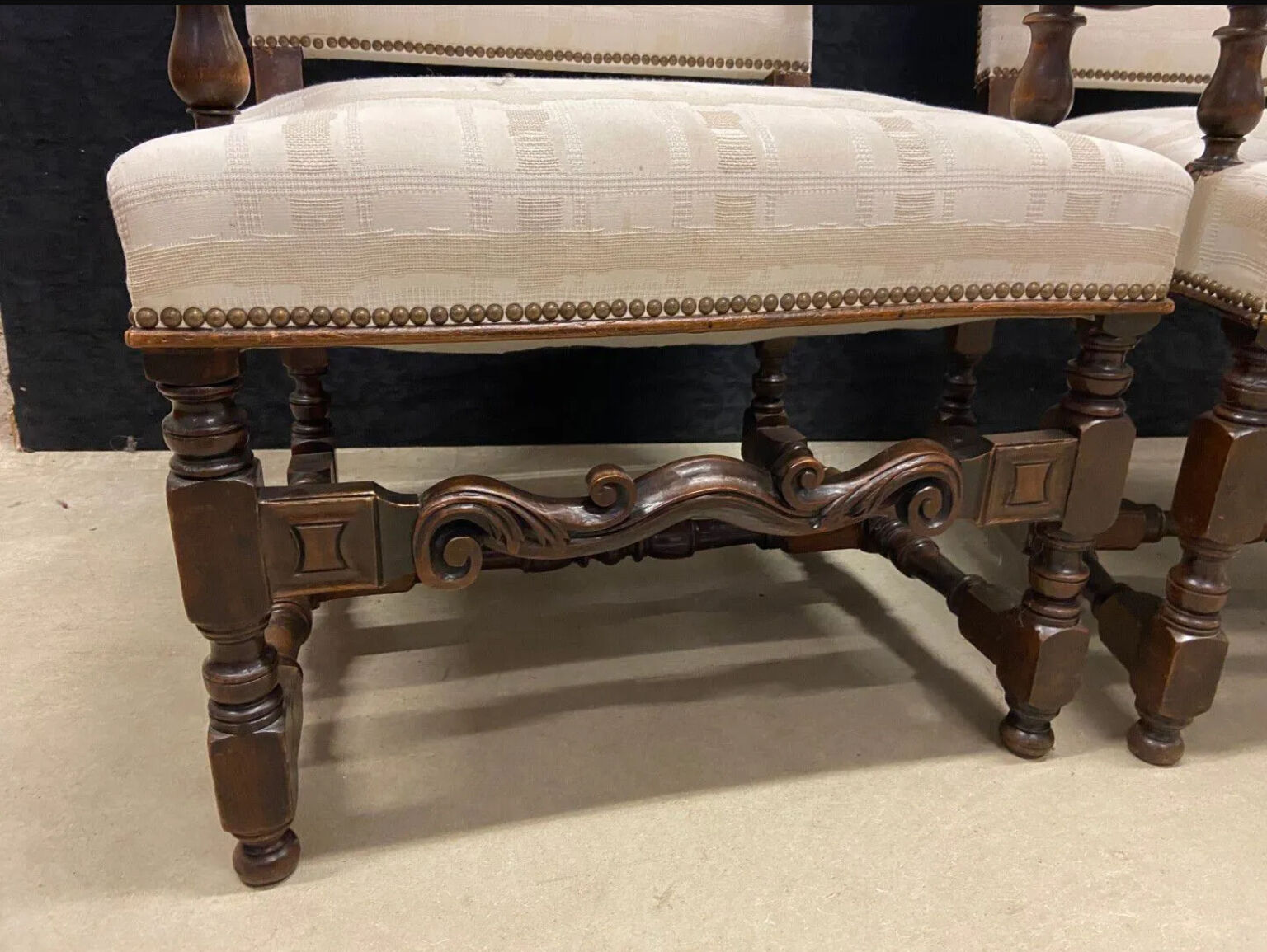 Pair of Louis XIII style molded wood armchairs