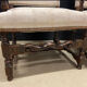 Paire de fauteuils en bois mouluré de style Louis XIII