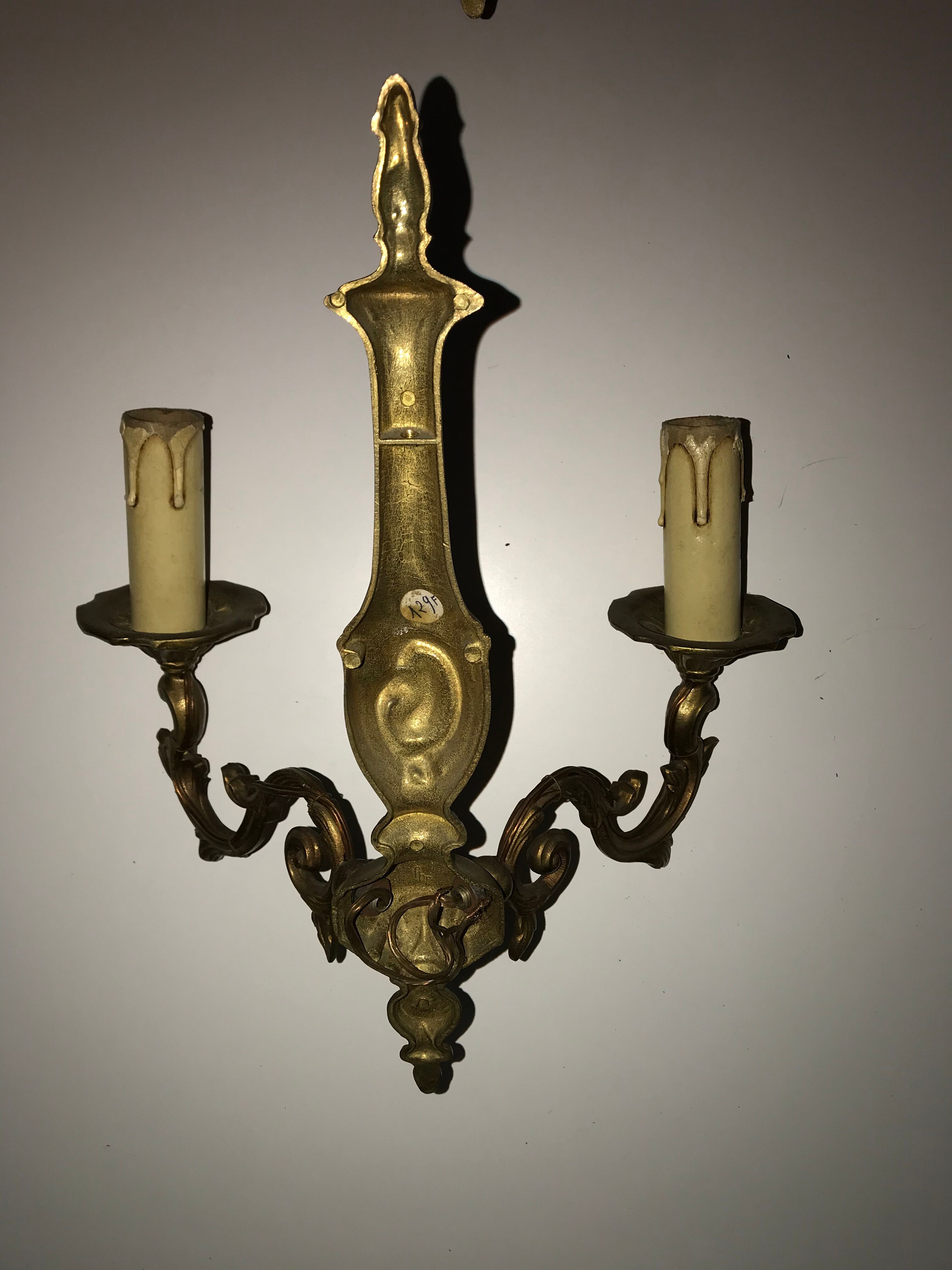 Pair of Louis XV style bronze wall sconces