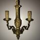 Pair of Louis XV style bronze wall sconces