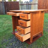 Vintage oak desk with 5 drawers and 1 pull.