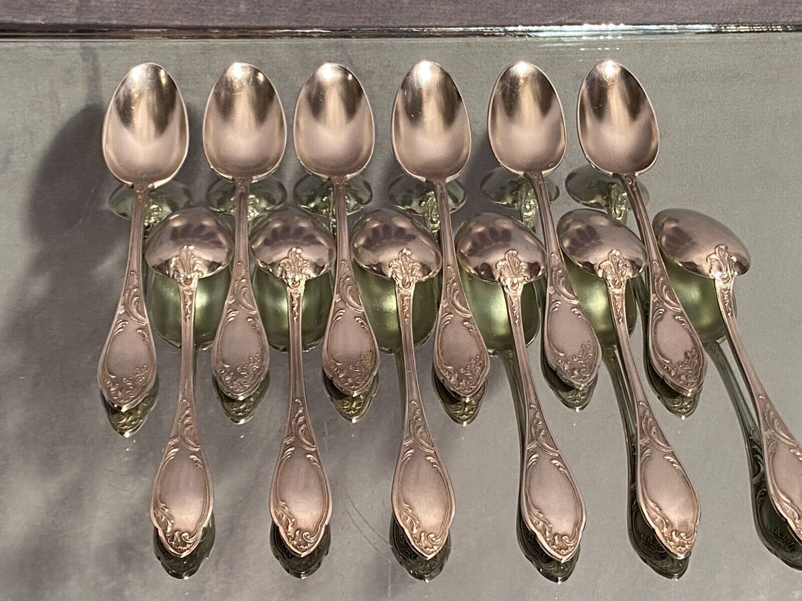 Suite of 12 small silver metal spoons in Louis XV style